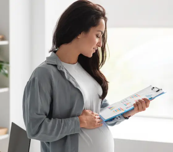 Surrogate Compensation & Benefits — base pay, allowances, travel, wellness support